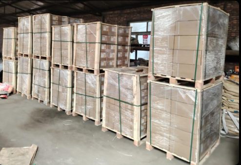 Export cartons protected and secured on pallets